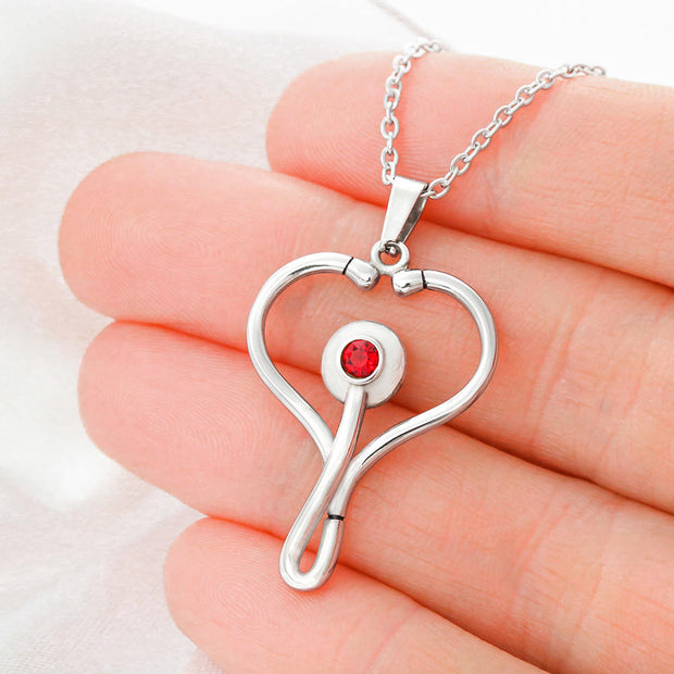Heart shaped Stethoscope hand made design .Features a red Swarovski® Crystal - aybendito