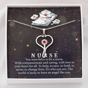 Heart shaped Stethoscope hand made design .Features a red Swarovski® Crystal - aybendito