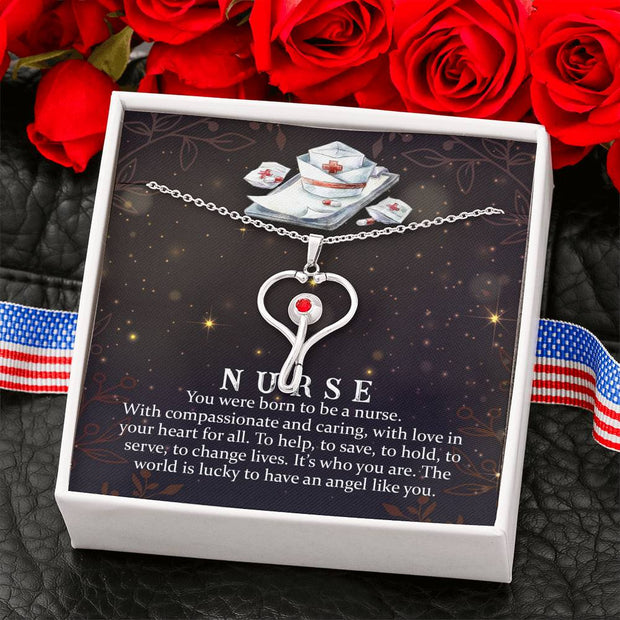 Heart shaped Stethoscope hand made design .Features a red Swarovski® Crystal - aybendito